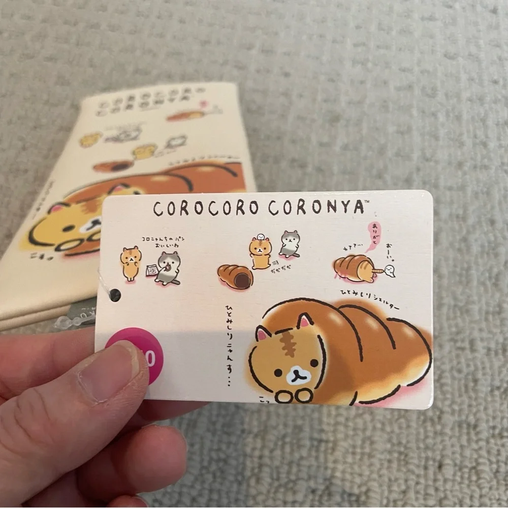 NWT corocorocoronya cat slim pouch